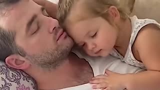 Dad And Babies Share Precious Moments.