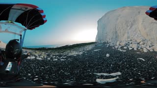 Incredible Two Way Sunset Cliff Base Jump