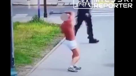 Poland Police confront a Ukrainian citizen casually waving an axe around the street