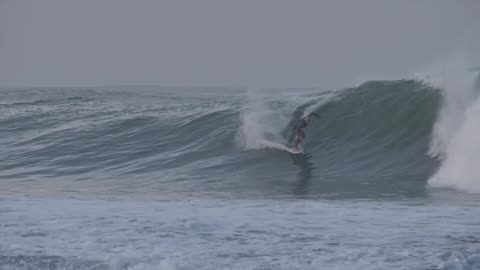 Surfer Surf on Ocean Waves