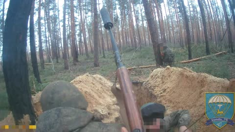 Sniper of Pskov paratroopers works in the forest belt near Kremenna