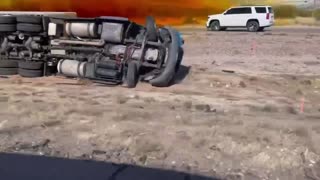 footage of truck carrying hazardous material overturned on I-10 in Tucson, Arizona