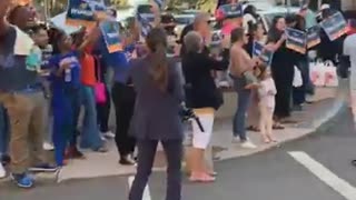 Demonstrators gather outside Walker-Warnock debate in Savannah, GA
