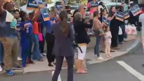 Demonstrators gather outside Walker-Warnock debate in Savannah, GA