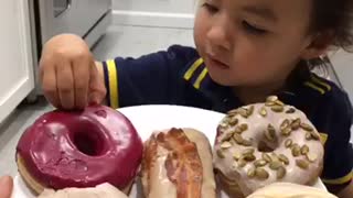 Toddler struggles to pronounce doughnut flavors