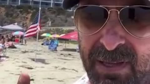 Loser Leftist Freaks Out Seeing American Flags On Beach