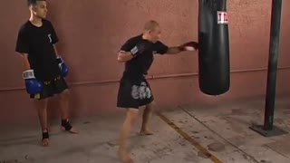 Mastering Muay Thai - Punching and Kicking the Heavybag - Master Paul Metayo