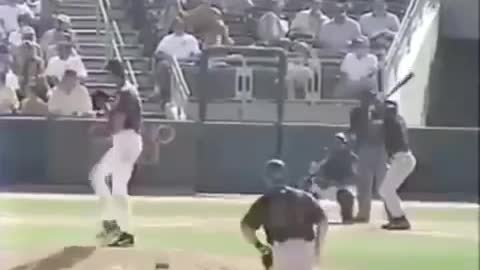Randy Johnson hits a bird with a pitch on March 24, 2001, during a spring training game. Baseball
