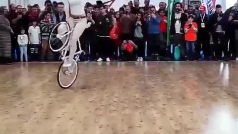 A women biker performs