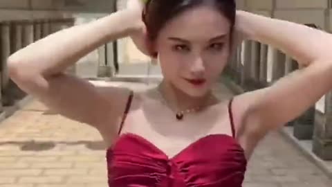 Chinese Woman in Red Dress Dodging Bat (Full Video)