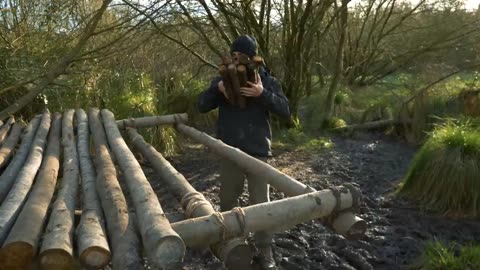 Constructing a wood shelter for wilderness survival | Bushcraft & cooking over a campfire