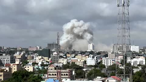 Aftermath of car bombs at Somali education ministry