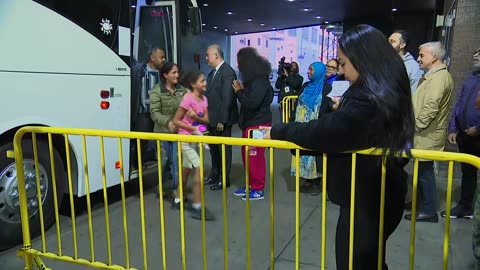 NYC official greets bus carrying 41 migrants sent by Texas Gov. Abbott