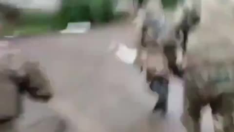 Russian forces in Bakhmut seen running away while "evacuating" a wounded soldier.