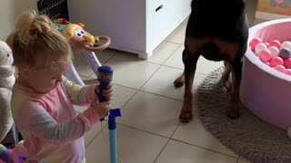 Adorable Duet by Kid and Dog