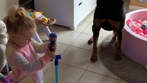 Adorable Duet by Kid and Dog