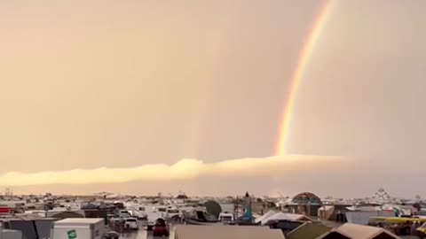 One dead and thousands stuck amid heavy rain and mud at Burning Man festival in Nevada.