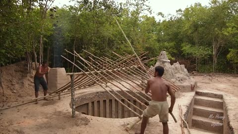 bilding underground hut with grass roof & fireplace with clay