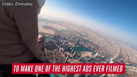 Emirates 'Flight Attendant' on Top of Burj Khalifa 828 METRE HEIGHT