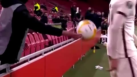 When ball boy helps his fan team