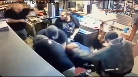 Workers fight back robber!