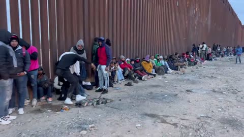 Lukeville, AZ, mass illegal crossing through a cut in the border wall