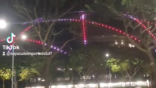 Driving Past OCBC Aquatic Centre in Singapore at Night