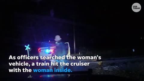 Train hits police car parked on Colorado tracks with suspect inside | USA TODAY