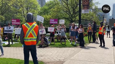 Counter-protesters at the Toronto March for Life begin chanting about transgender individuals