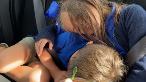 Sleepy Kids Interact with Snake Obliviously