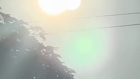 Caught the real sun reveal itself from behind the fake sun