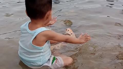 children playing on the beach with their friends are very happy