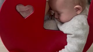 Baby Sleeps in Doll's Stroller