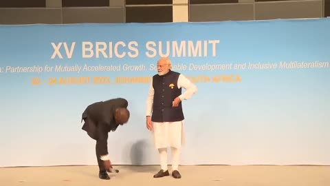 RESPECT for the National Flag 🫡 PM Modi picks up the Tricolour during BRICS Summit 🇮🇳