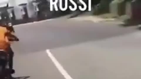 Fake Valentino Rossi is racing on the road