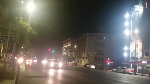 Busy street at night in Bucharest