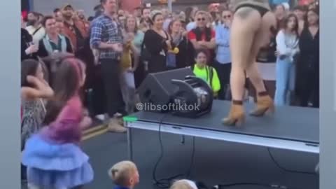 Drag Queen Teaching a Youngster how to Twerk