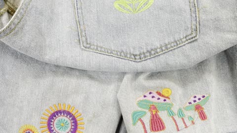 Let’s bring this denim into the groovy 60’s! #machineembroidery #denimembroidery