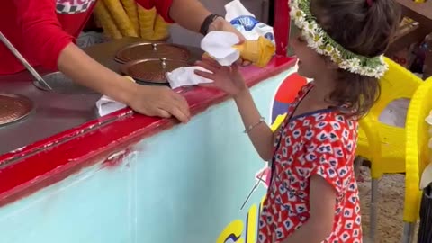 kid enjoy turkish ice cream with fun