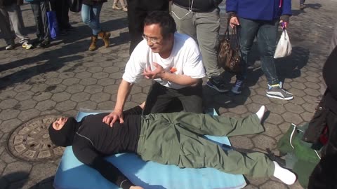 Luodong Massages White Man In Weird Shirt