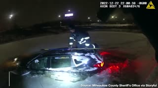 Rescue Team Saves Woman from Car Submerged in Frozen Pond