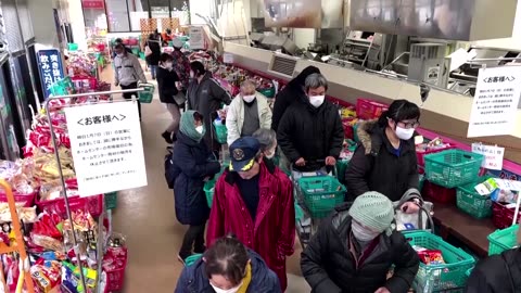 Japanese 'grateful' as supermarket reopens after quake