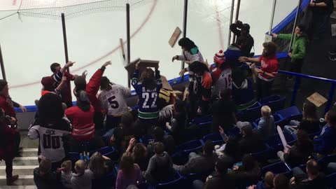 Flying Pizzas Excite the Hockey Crowd