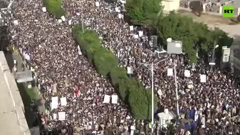 Protesters rally to commemorate the seventh anniversary of the war in Yemen.