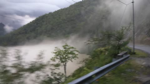 CLOUD FLOATING ON THE RIVER