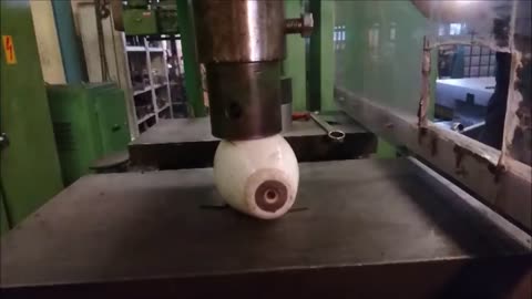 Crushing bowling ball and pin with hydraulic press