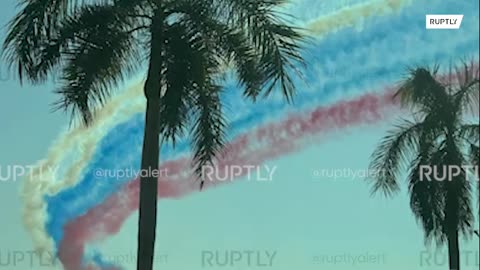 The sky over Abu Dhabi is painted in the colors of the Russian flag