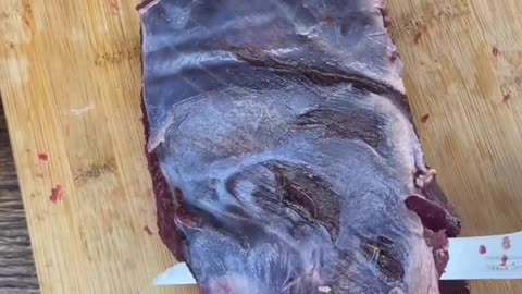 Cleaning up a bottom round roast from a deer