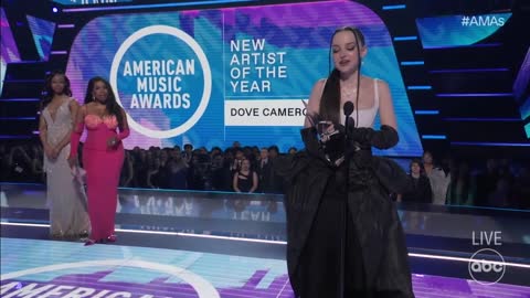 Dove Cameron Accepts the 2022 American Music Award for New Artist of the Year - The American Music A