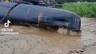 [CHINA] SUBMARINE Washed Up After Biblical Chinese Floods